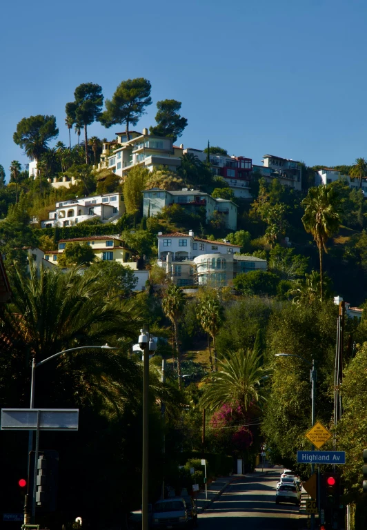 a mountain with houses on it as seen from the street