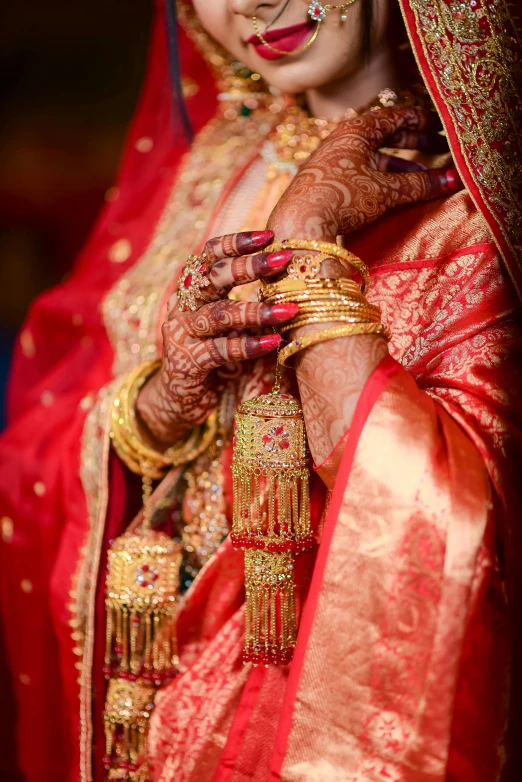 the indian bride with her bridals