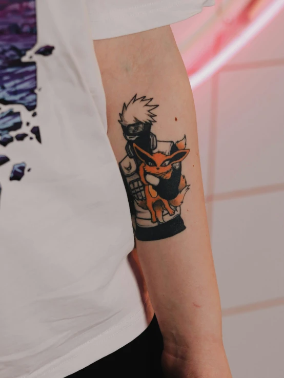 a tattoo of a guy holding an anime cat