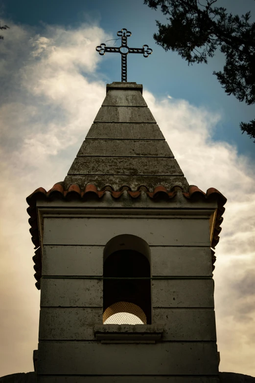 a tower with a clock mounted to it's side