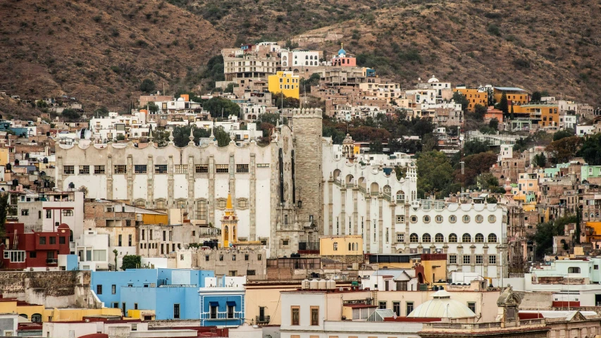 a city with lots of colorful buildings in the middle