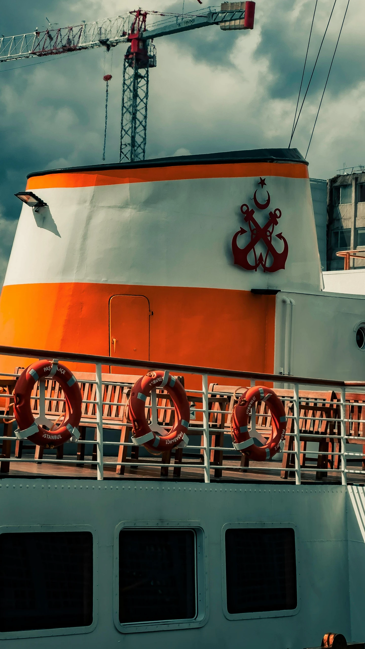 a boat with a big tower behind it