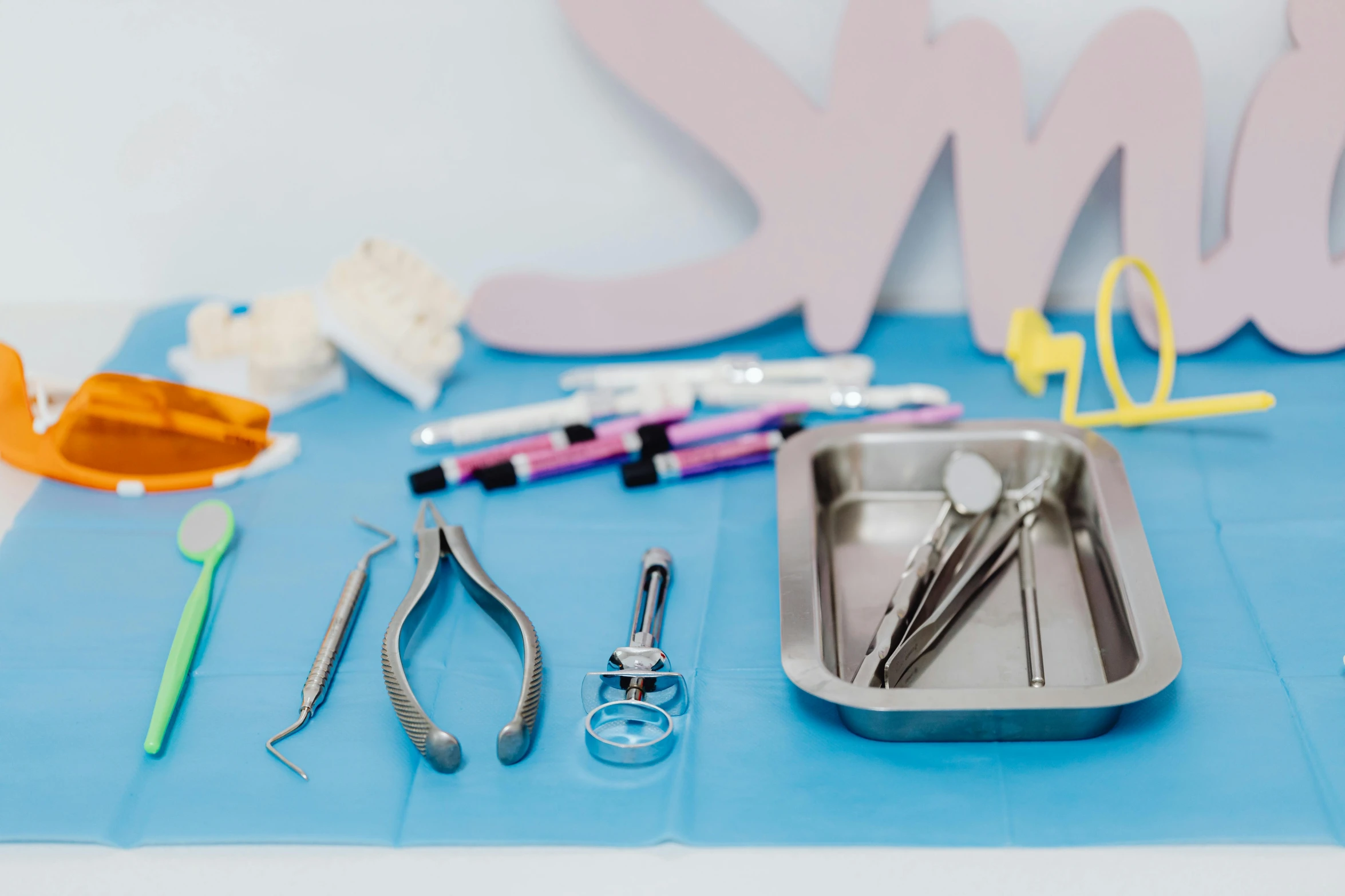 a small metal tray with different items on it