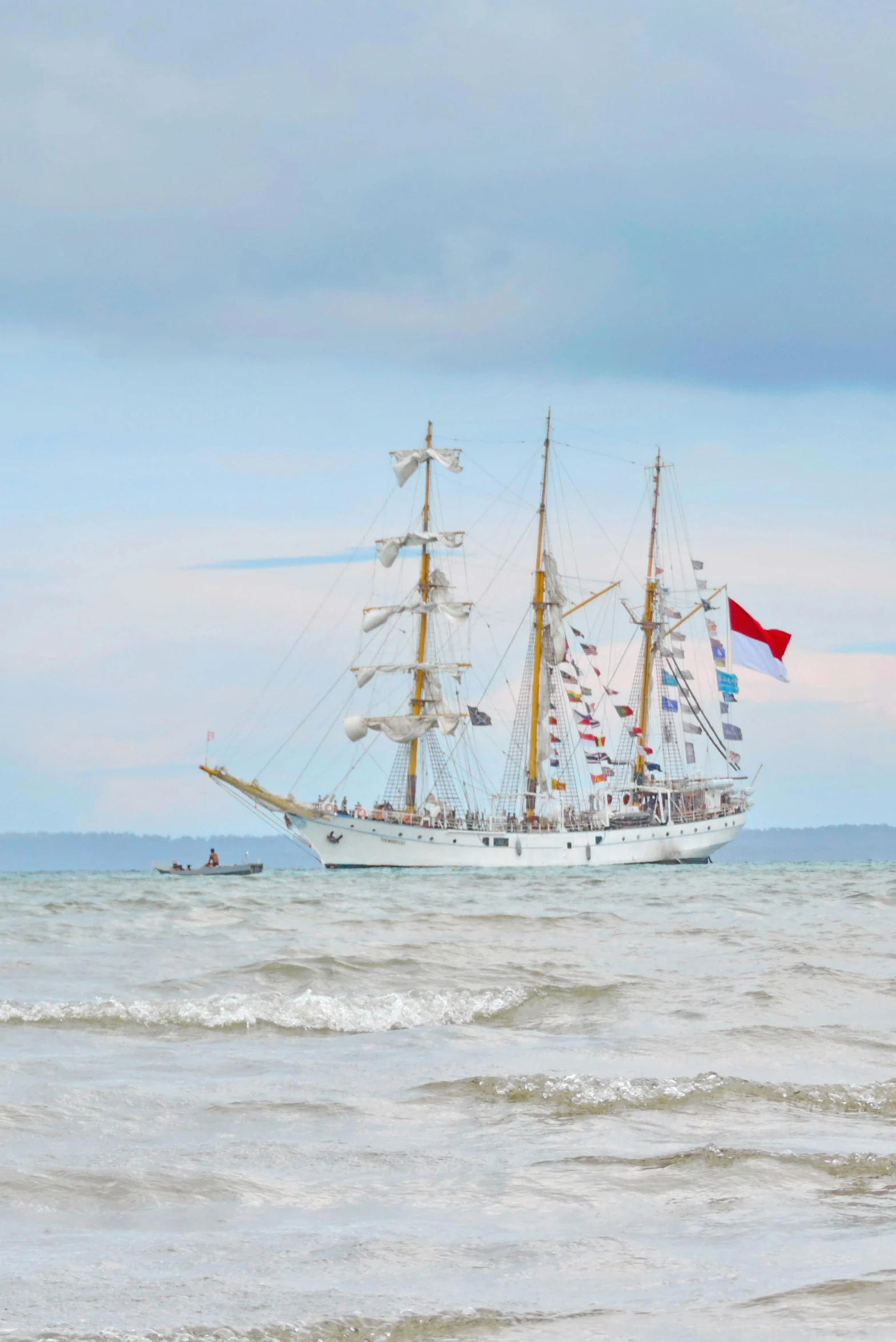 a large boat is in the open ocean