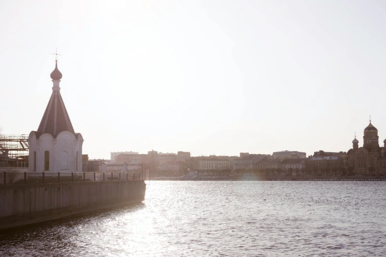 an architectural structure on the banks of a river