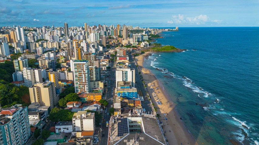 an aerial view of a large city near the water