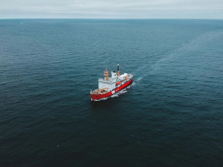 a large ship is sailing in the open water