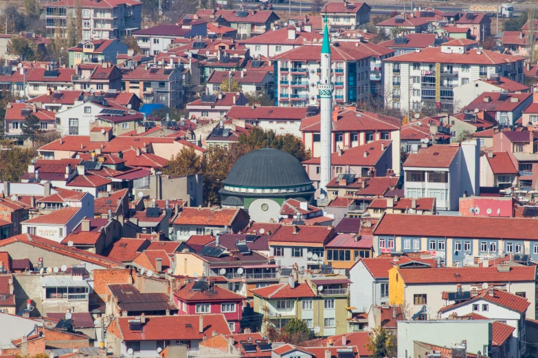 a large city with many buildings and a very tall clock tower