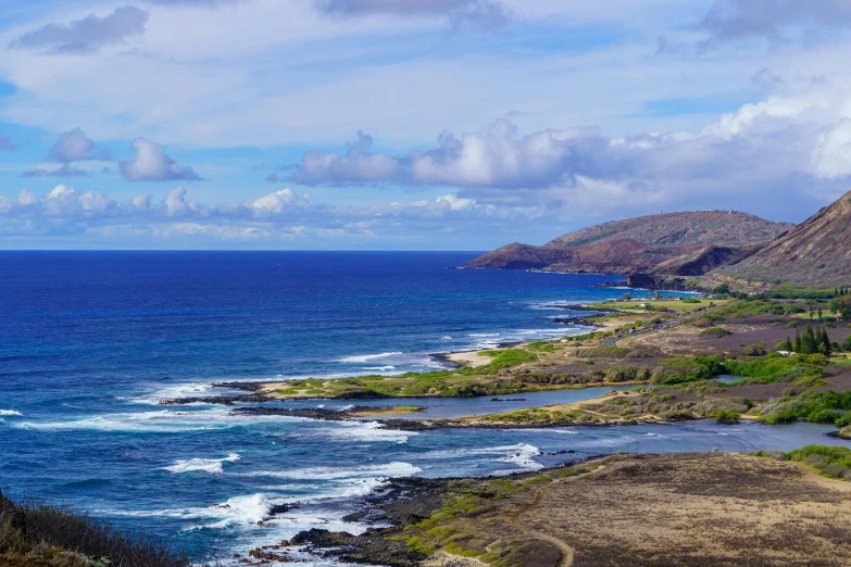 a scenic view looking out at the ocean from an overlook point