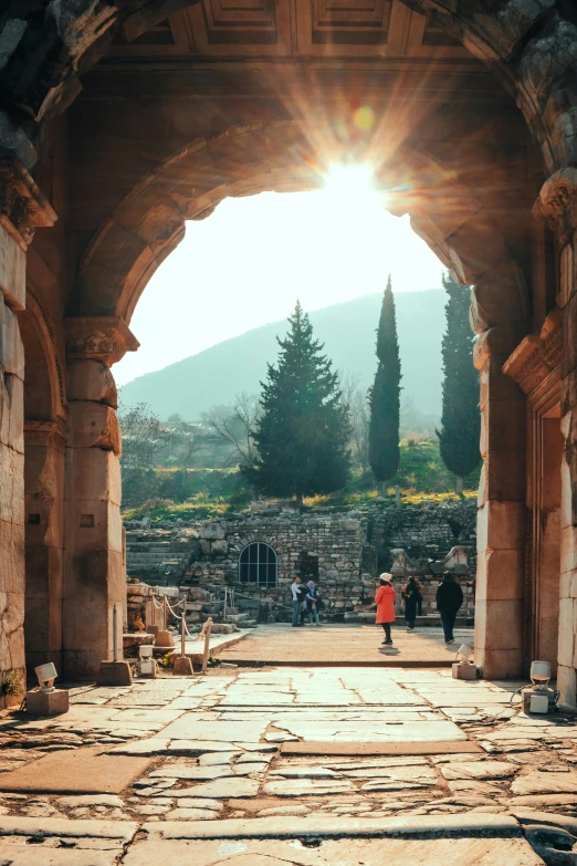 there is an arch between two stone structures