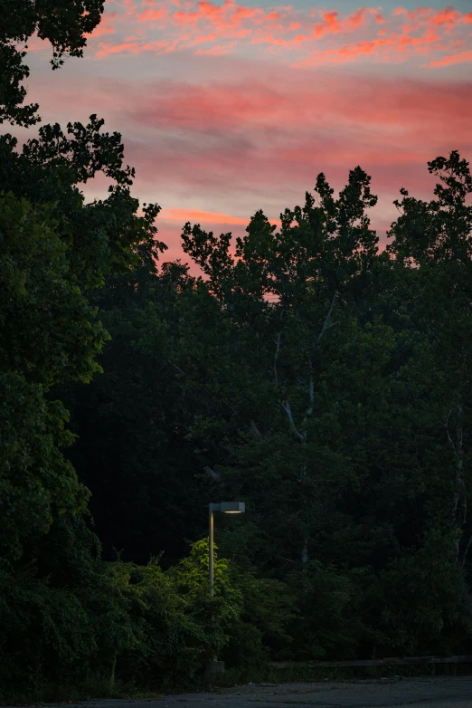 an image of a twilight sky with a pink sunset