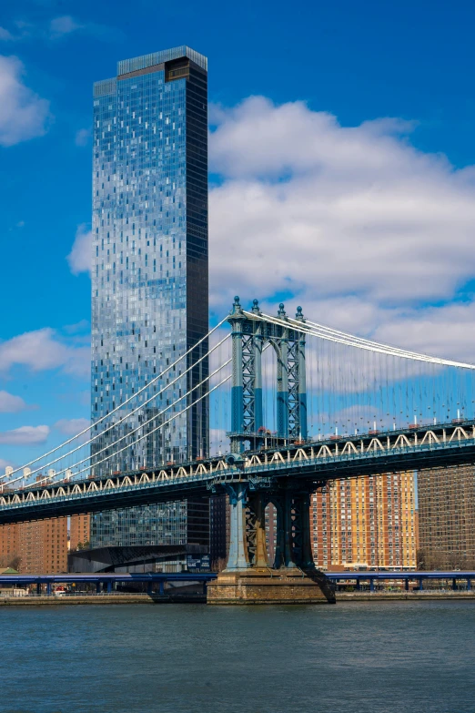 a very tall bridge spanning across the water