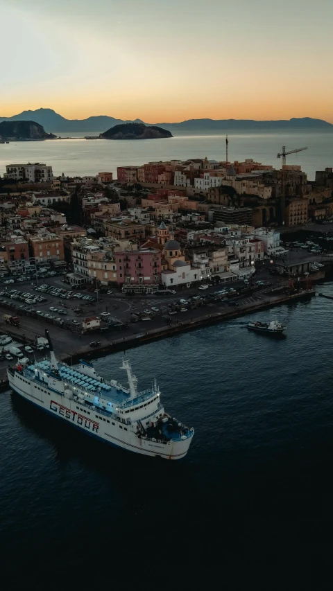 a ferry passes through a port and into the water