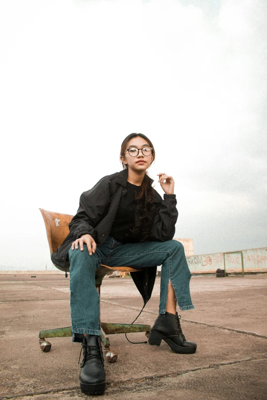 a woman is smoking on her skateboard