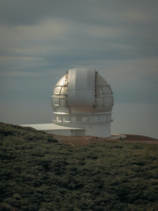 this observatory is on a hill and has a long tower with bars on top