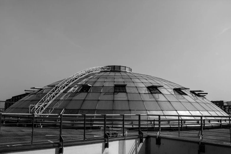 the dome building is surrounded by scaffolding and surrounding railing