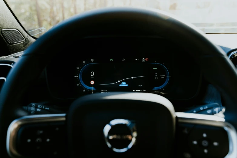 the dash of the car with its lights on