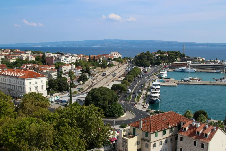 an aerial view of a large lake, surrounded by buildings