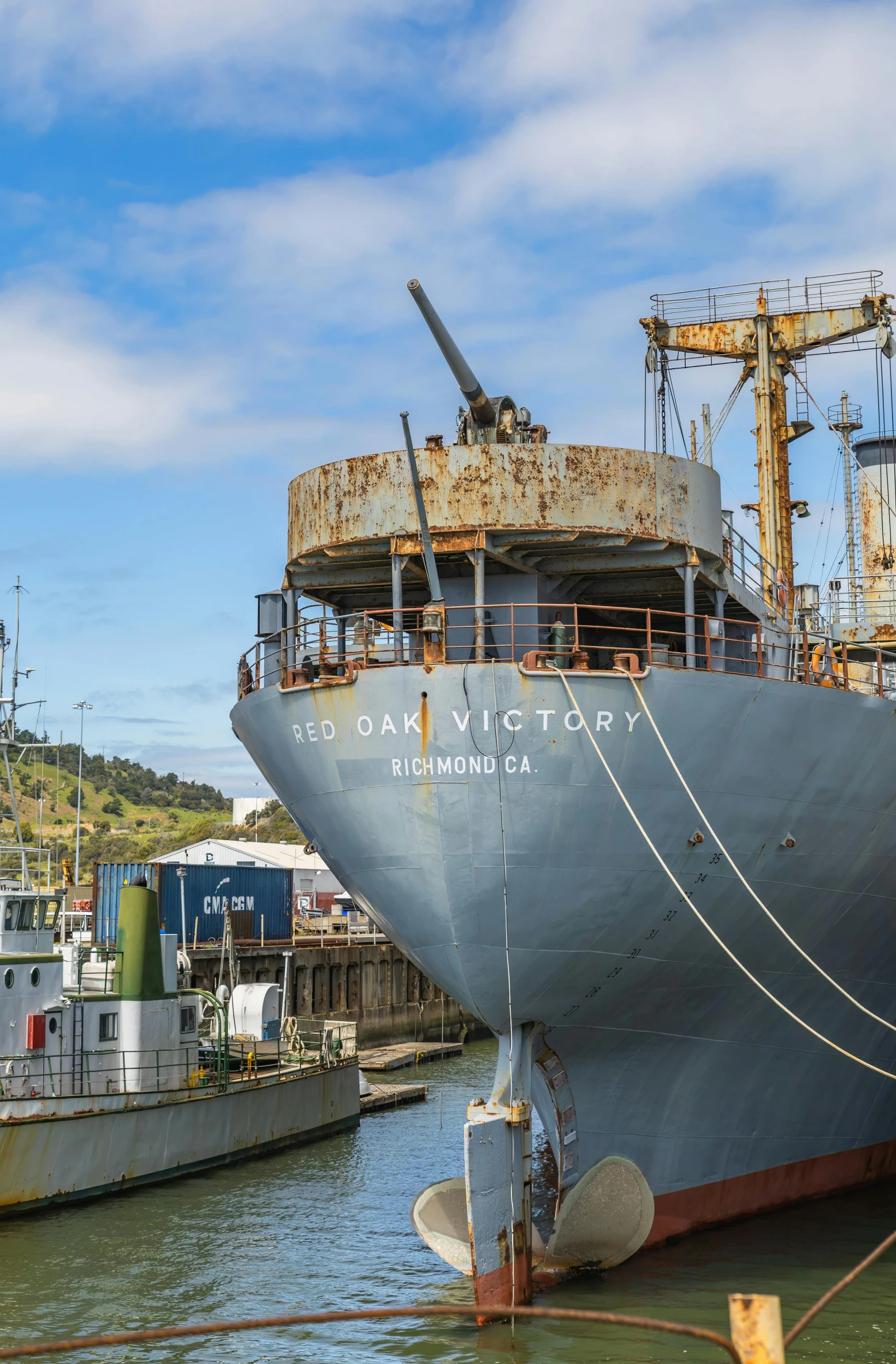 a large ship is docked in the water