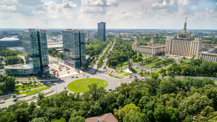 view from the top of a skyscr looking down at a park in the center of the city