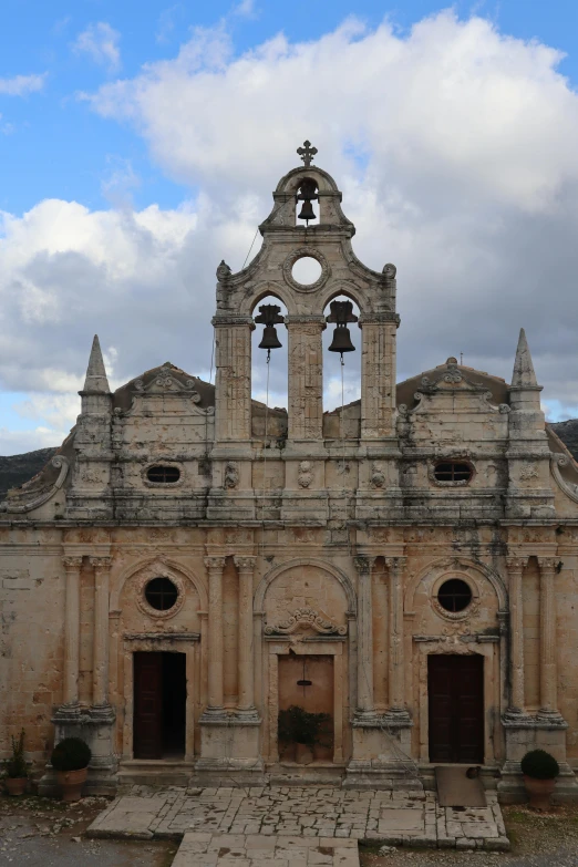 old and run down stone church with bell towers