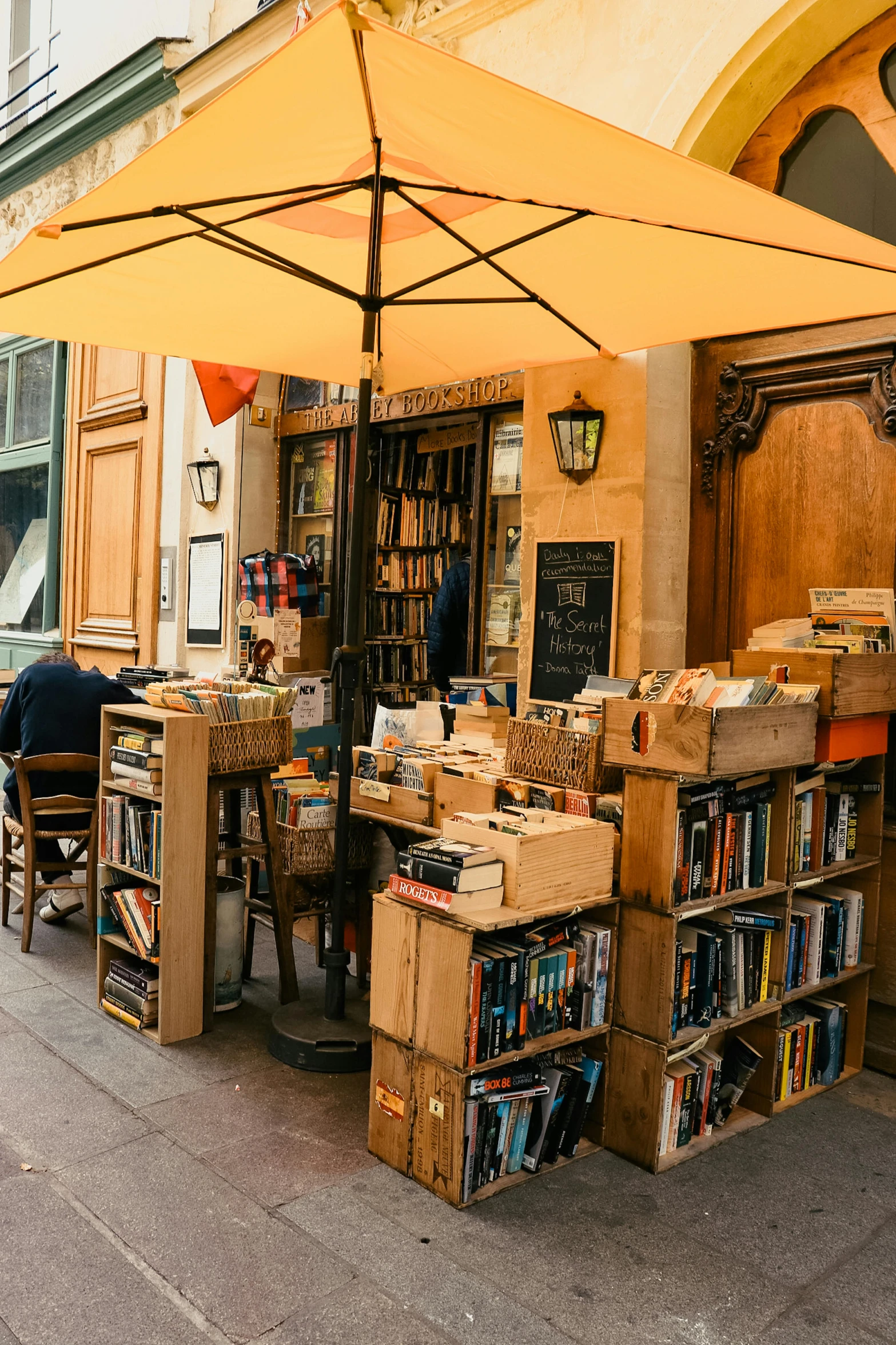 a street side book market with many books