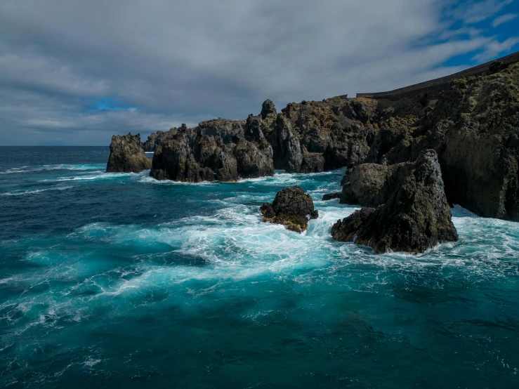 a large body of water next to a shore