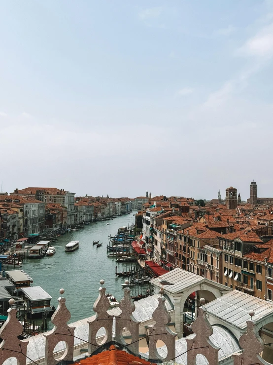 a large body of water surrounded by small buildings