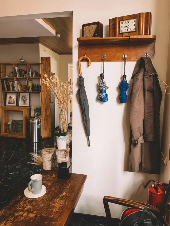 some wooden shelves that have hooks on them