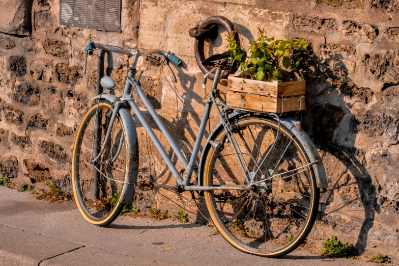 there is a bike that is  to a wall