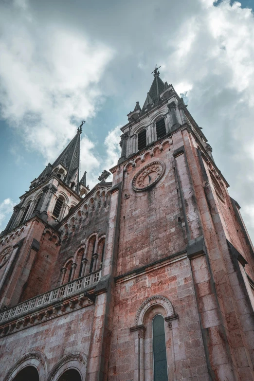 this old church has an intricate tower that stands high on the building