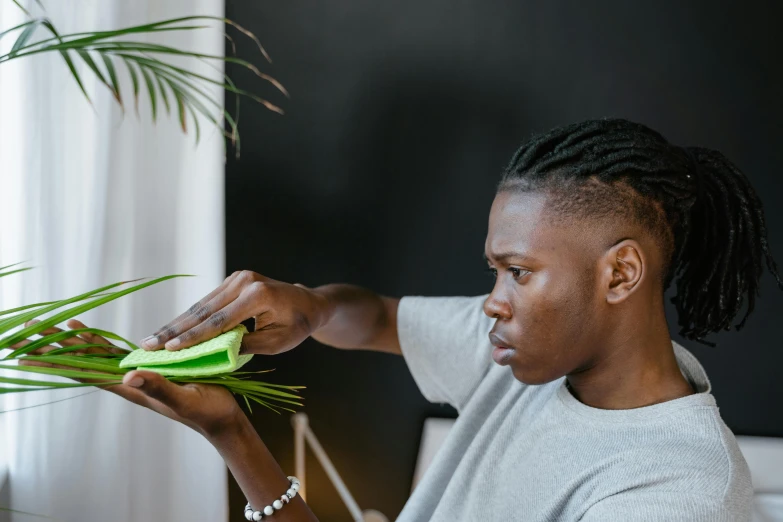 a woman peeling a banana off the side of her head