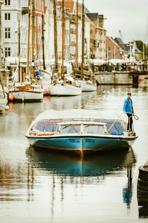 a boat in the water near many boats