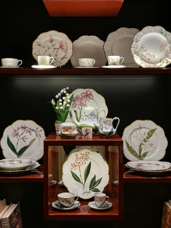 a collection of chinese plates and cups