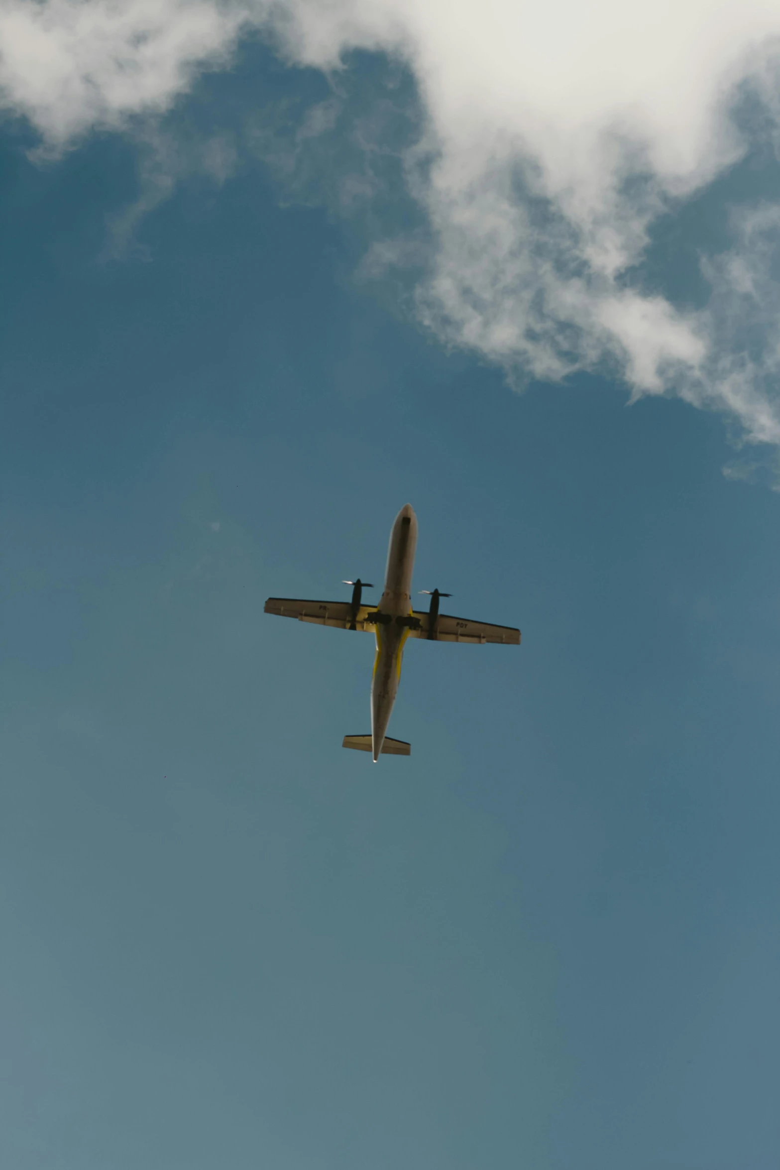 an airplane flying through the sky on a clear day