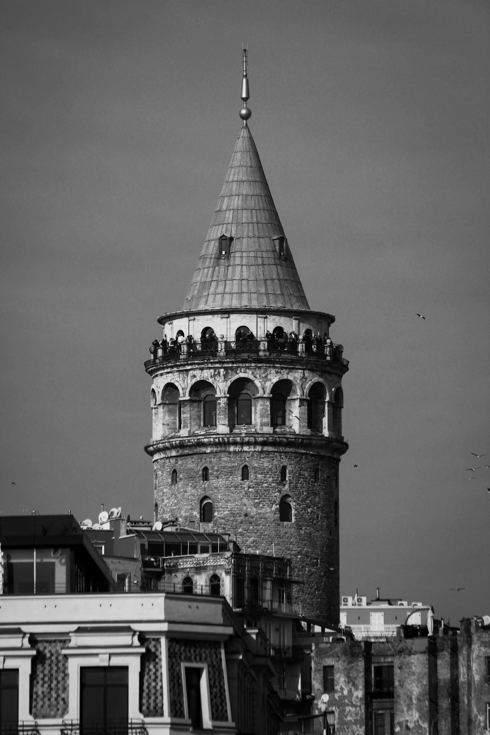 black and white po of a tower with balconies