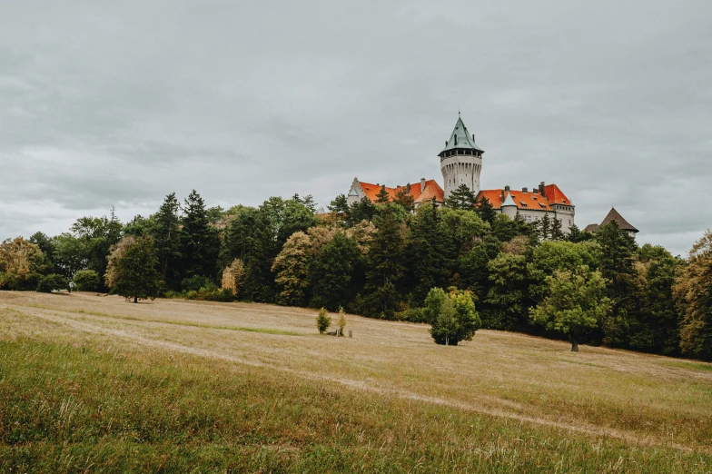 an old church sitting on top of a hill