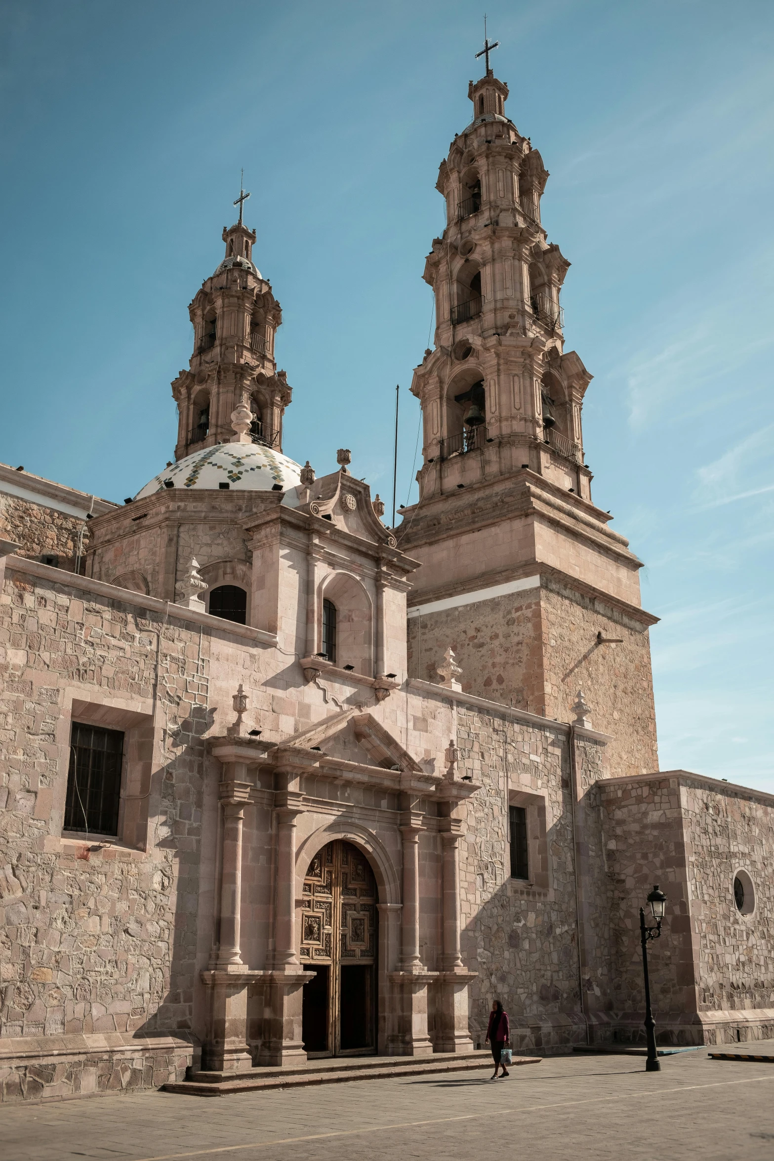 an old church building with two spires