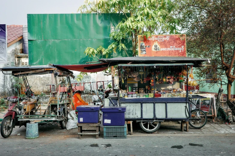 a small store sitting on the side of a road