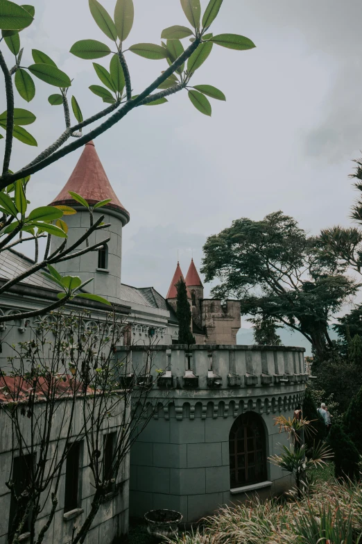 an old house with two towers on top