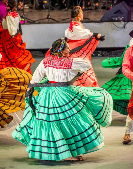 mexican dancers in a colorful dress at the mexican fiesta