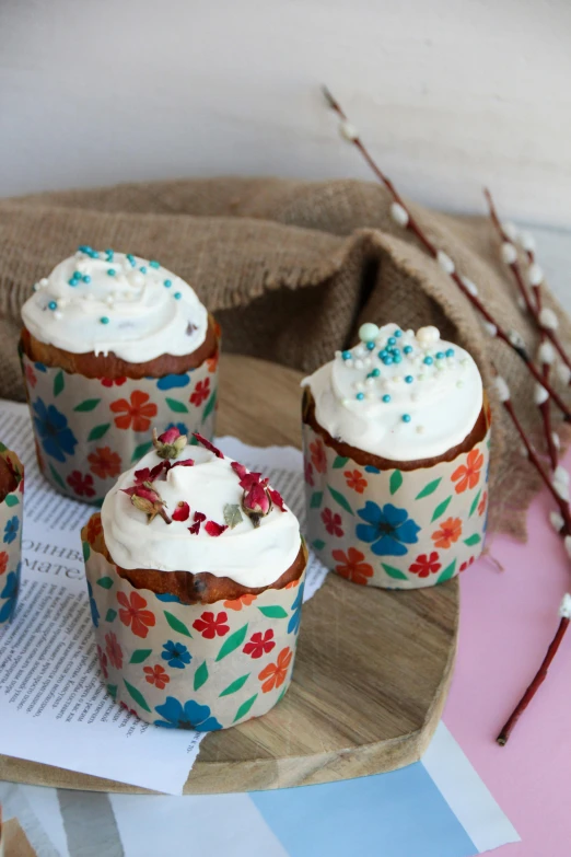 cupcakes that are decorated with frosting on top of a plate