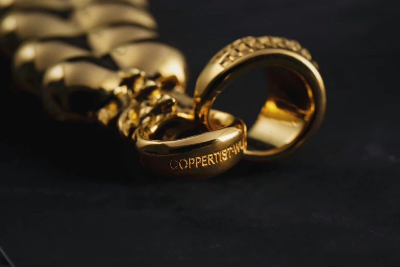 the gold rings are written in large letters