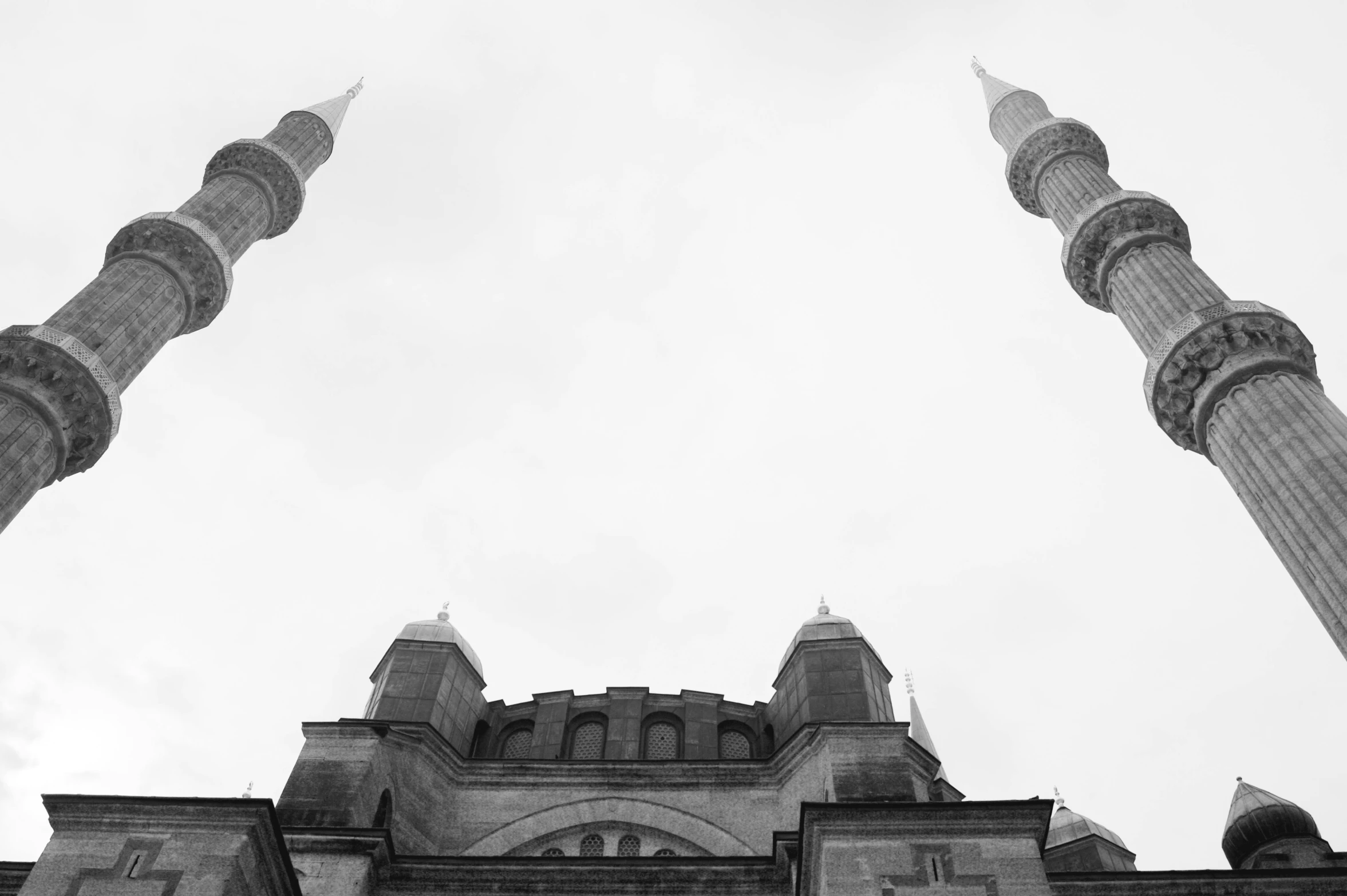 three towering buildings with multiple spires at the bottom