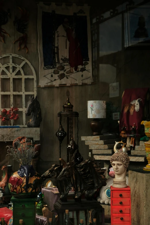 a colorful display in the middle of a room with antiques