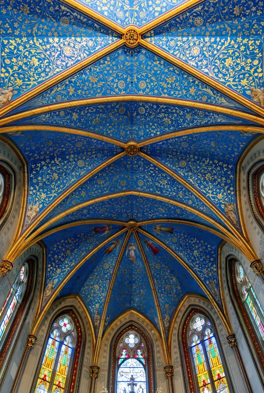 the ceiling is a work of art in a church