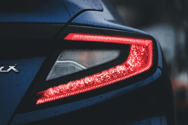 the tail light is illuminated in red glitter