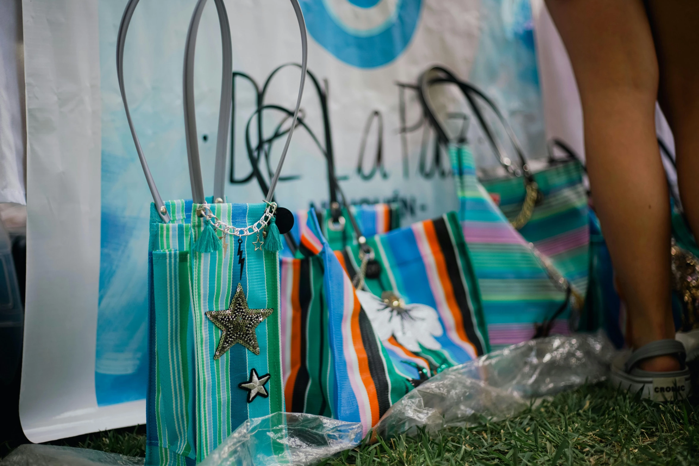 a group of colorful bags are on display