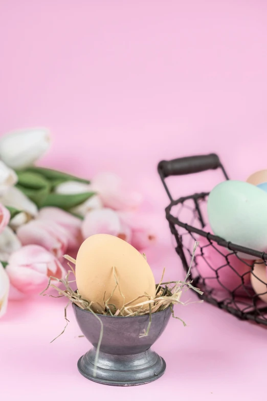 two plastic easter eggs in a egg cup