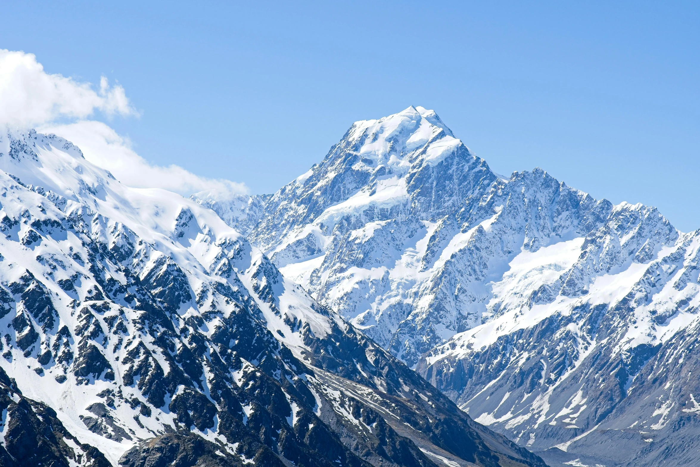 there are a few snow covered mountains in the distance